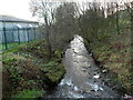 River Llynfi flows away from a footbridge, Maesteg