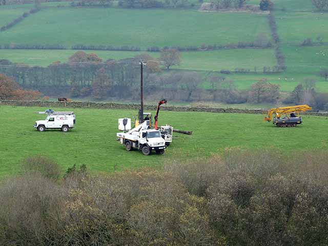 Installing a new electricity transmission line.