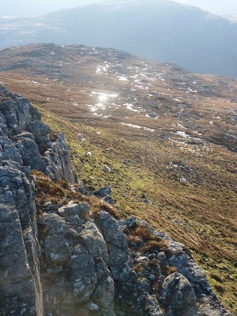 Rocks below Beinn Mheadhanach with Beinn Iomalach in the middle distance