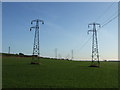 NZ4042 : Farmland with pylons by JThomas