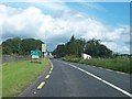 M7390 : The N5 at the southern entrance to the village of Frenchpark by Eric Jones