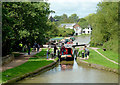 Narrowboat leaving Middlewich Bottom Lock, Cheshire