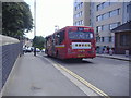 E7 bus on Argyle Road railway bridge, West Ealing