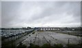 Derelict land and parked cars