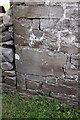 Benchmark on barn at Holly House