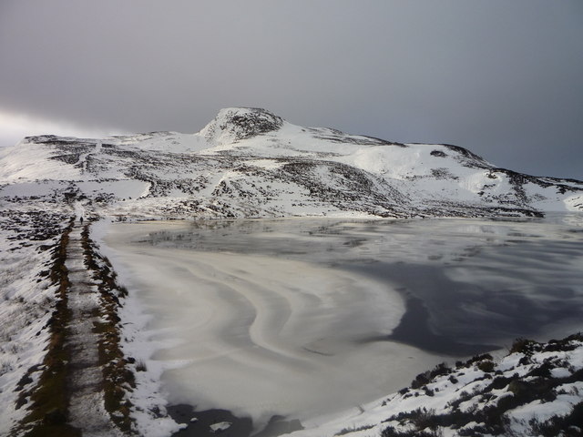 Meall na h-Aodainn Mòire across a partially frozen Loch a' Choire