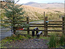 SN7285 : Stile into the Welsh Water estate at Craig y Pistyll by John Lucas