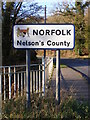 TM2482 : Norfolk sign at Shotford Bridge by Geographer