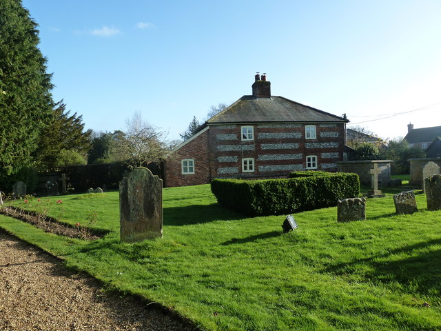 All Saints, Hannington: hedge in the churchyard