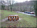 Wooden picnic tables at Llantysilio Green car park