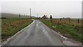 A road passes Sandhole Cottage