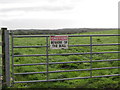 A cautionary notice alongside the Milltown Road