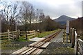 SH5750 : Crossing on the Welsh Highland Railway by Jeff Buck