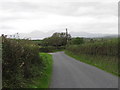 View west along Erenagh Road with The Mournes in the background