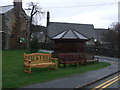 Three benches and a bus shelter