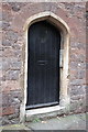 Benchmark on doorstep of #27 Bartholomew Street West