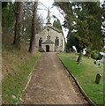 Entrance path to Grade II listed Church of the Holy Trinity, Slad