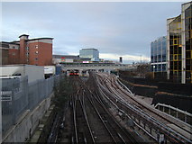 TQ3884 : View of the Jubilee line, the DLR and Westfield from Stratford High Street by Robert Lamb