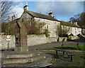 Village pump and the old vicarage, Hartington