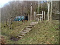 Steps up to a stile at the edge of the A468 west of Machen