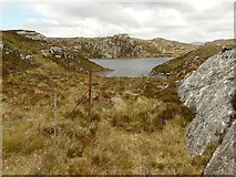 NC1843 : Loch na h-Airigh Slèibhe through a Scourie dyke by AlastairG