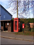 TM2782 : Bus Shelter,Telephone Box & Sir Alfred Munnings Hotel Postbox by Geographer