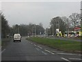 A41 approaching the traffic light crossroads at RAF Cosford