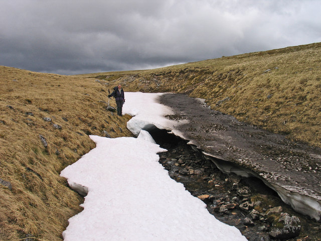Snow banks in stream groove draining into Moy Corrie