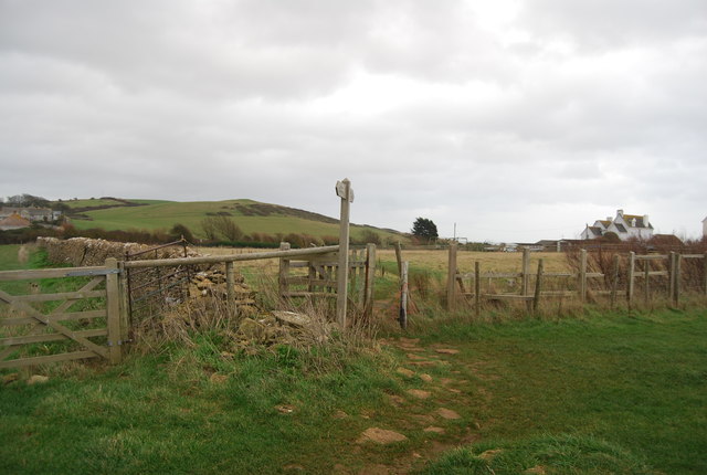Footpath sign and stile