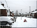 TL4756 : Snow in the suburbs: Lichfield Road by John Sutton