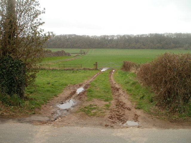 Muddy entrance to a field alongside the ancient west wall, Caerwent