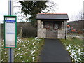 SJ1861 : Bus stop information point near Llanferres by Jeremy Bolwell