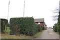 Cottage near Television masts on Hillwood Common road