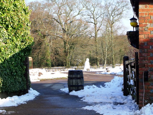 Barrel and distant snowman, Tulley's Farm, Turners Hill