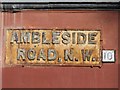 Sign for Ambleside Road, NW10