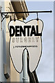 NY5361 : A dentist's sign in Brampton by Walter Baxter