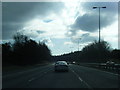SU7793 : M40 nears Bigmore Lane bridge by Colin Pyle