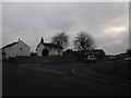 Approaching the junction of Orchard Close and Frater Lane