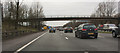 This footbridge carries the Glazebrook Trail over the M62 at Great Woolden Moss