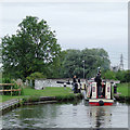 Narrowboat entering Lock No 68 near Middlewich, Cheshire