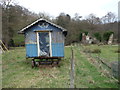 Old bathing hut in a field above the River Alyn / Afon Alun near Bradley