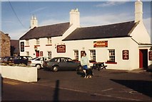 NU2519 : The Jolly Fisherman Inn, Craster, in September 1990 by Ann Cook