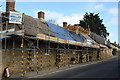 Thatching in progress, West Street.