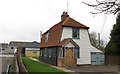 Weatherboarded Cottage near Old Whitmans Farm