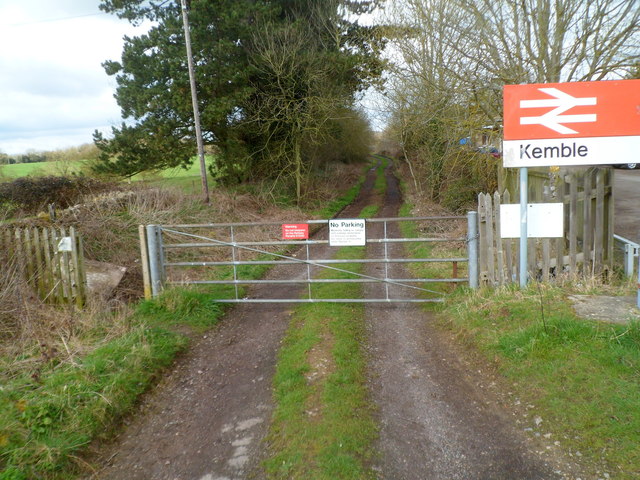 Gate at the edge of a track into Kemble railway station