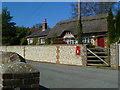 Cottages and post box in Slindon