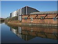 TQ2282 : Contrasting buildings, Grand Union Canal by Derek Harper