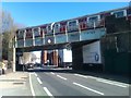 TQ2476 : District Line train passing over New King's Road by David Martin