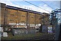 Graffiti, trackside building, Kenton