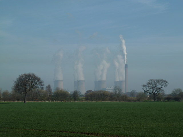 A field, two trees and a power station